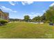 Expansive grassy backyard with pool and patio at 498 New Salem Rd, Statesville, NC 28625