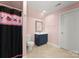 Charming bathroom with dark vanity and pink accents at 498 New Salem Rd, Statesville, NC 28625