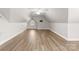 Spacious bonus room with light brown laminate flooring at 498 New Salem Rd, Statesville, NC 28625