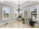 Bright breakfast area with tile floors and plantation shutters at 498 New Salem Rd, Statesville, NC 28625