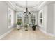 Bright breakfast area with tile floors and plantation shutters at 498 New Salem Rd, Statesville, NC 28625