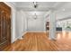 Open concept dining room with hardwood floors and elegant light fixtures at 498 New Salem Rd, Statesville, NC 28625