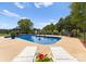 Stunning inground pool perfect for relaxation, with lounge chairs and landscaping at 498 New Salem Rd, Statesville, NC 28625