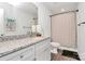 Modern bathroom with granite countertops, a shower, and toilet at 5510 Brickstone Dr, Charlotte, NC 28227