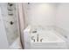 Clean bathroom with a shower and a bathtub at 5510 Brickstone Dr, Charlotte, NC 28227