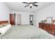 Bright bedroom featuring a king-size bed and ample closet space at 5510 Brickstone Dr, Charlotte, NC 28227