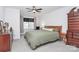 Spacious bedroom with a large bed, dresser, and window at 5510 Brickstone Dr, Charlotte, NC 28227