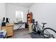 Home office features a desk, keyboard, and bicycle at 5510 Brickstone Dr, Charlotte, NC 28227