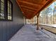 Long covered walkway with wooden beams and supports at 5700 Mcwhorter Rd, Waxhaw, NC 28173