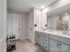 Well-lit bathroom with double vanity, modern fixtures, and a tiled floor at 571 Palmarosa St # 130, Fort Mill, SC 29715