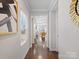 Hallway with hardwood floors and view into a living space at 571 Palmarosa St # 130, Fort Mill, SC 29715