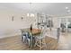 Farmhouse style dining room with green table and metal chairs at 674 Dunkins Ferry Rd, Rock Hill, SC 29730