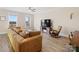 Living room with sectional sofa, rocking chair, and hardwood floors at 674 Dunkins Ferry Rd, Rock Hill, SC 29730