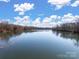 Serene view of a calm river with lush trees at 674 Dunkins Ferry Rd, Rock Hill, SC 29730