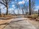 Paved walking trail through a wooded area near the river at 674 Dunkins Ferry Rd, Rock Hill, SC 29730