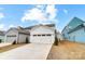 New home with white garage door at 693 Candela Ct, York, SC 29745