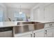 Modern kitchen features stainless steel appliances and white cabinetry at 693 Candela Ct, York, SC 29745