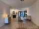 Living room with fireplace and French doors at 715 21St Ne Ave, Hickory, NC 28601