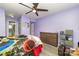 Bedroom with multicolored bedding and dresser at 9427 S Vicksburg Park Ct, Charlotte, NC 28210