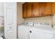 Laundry room with Whirlpool washer and dryer at 9427 S Vicksburg Park Ct, Charlotte, NC 28210