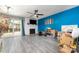 Living room with fireplace and sliding glass doors at 9427 S Vicksburg Park Ct, Charlotte, NC 28210