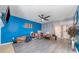 Spacious living room with blue walls and hardwood floors at 9427 S Vicksburg Park Ct, Charlotte, NC 28210