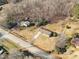 Aerial view showing house and surrounding wooded area at 1241 Red River Rd, Rock Hill, SC 29730