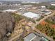 Aerial view of property near businesses and a wooded area at 1241 Red River Rd, Rock Hill, SC 29730