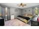 Spacious primary bedroom with king-size bed and gray walls at 1241 Red River Rd, Rock Hill, SC 29730