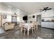 Open concept dining area with a table and chairs, flows into the living room at 1241 Red River Rd, Rock Hill, SC 29730