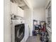 Bright laundry room with washer, dryer, and ample storage at 1241 Red River Rd, Rock Hill, SC 29730