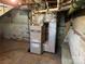 Unfinished basement with HVAC unit and exposed brick at 147 W Mcneely Ave, Mooresville, NC 28115