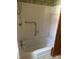 Clean bathroom with tiled walls, bathtub and shower at 147 W Mcneely Ave, Mooresville, NC 28115