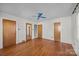 Spacious bedroom with hardwood floors and ceiling fan at 147 W Mcneely Ave, Mooresville, NC 28115