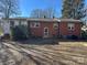 Red brick house with a back yard at 147 W Mcneely Ave, Mooresville, NC 28115