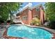 Backyard features a refreshing in-ground pool, perfect for outdoor relaxation and entertainment at 15613 Glen Miro Dr, Huntersville, NC 28078