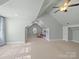 Spacious bonus room with built-in shelving at 1629 Southpoint Ln, New London, NC 28127