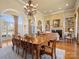 Open dining room with hardwood floors and view to kitchen at 1629 Southpoint Ln, New London, NC 28127