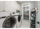 Laundry room with Samsung washer and dryer at 1629 Southpoint Ln, New London, NC 28127