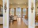 Open living space with hardwood floors and arches at 1629 Southpoint Ln, New London, NC 28127