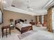 Spacious main bedroom with ample natural light and sitting area at 1629 Southpoint Ln, New London, NC 28127