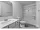 Clean bathroom with a bathtub, toilet and vanity at 1739 Dunloe St # 8242, Charlotte, NC 28206