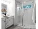 Elegant bathroom with double vanity and large walk-in shower at 1739 Dunloe St # 8242, Charlotte, NC 28206