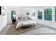 Bright bedroom with large windows and neutral color palette at 1739 Dunloe St # 8242, Charlotte, NC 28206