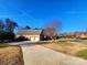 Long driveway leading to a two-car garage at 210 Classic Ct, Mount Holly, NC 28120