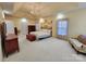 Main bedroom with sitting area, trey ceiling and large windows at 210 Classic Ct, Mount Holly, NC 28120