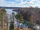 Aerial view showcasing waterfront property with private dock and lake access at 2143 Manawa Ln, Fort Mill, SC 29708