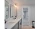 Double vanity bathroom with gray cabinets and quartz countertop at 2143 Manawa Ln, Fort Mill, SC 29708