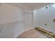 Bright laundry room with ample shelving and vinyl flooring at 2143 Manawa Ln, Fort Mill, SC 29708