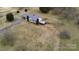 Aerial view of a ranch style home on a large lot with surrounding trees at 2356 Ben Yount Ln, Vale, NC 28168